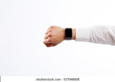Closeup of male hand wearing digital smart wrist watch with blank screen, isolated on white background, top view. Technology and gadget concept