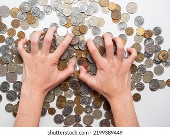 Close-up of male hands lying on coins of Russian rubles. The concept of wealth and affluence. Economy, money, business. Top view, flat lay - Shutterstock ID 2199389449