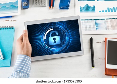 Close-up, Male Hands With Tablet. Businessman Working At The Table In Office. Computer Security Concept