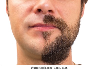 Closeup Of Man With  Beard On Half Of The Face On White Background