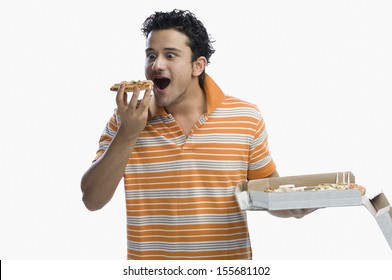 Close-up Of Man Eating Pizza