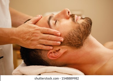 Premium Photo  Masseur doing neck massage on man in the spa salon