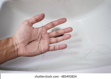 Close-up A Man Hand With Loss Hair, After Taking Shower, Concepts Of Loosing Hair