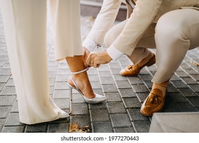 Closeup Man Helping Woman Put Her Stock Photo 1977270443 |Shutterstock