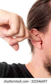 Closeup Man Holding A Finger In His Ear With Ear Bleeding, Isolated On White, Concept Noise And Wounds