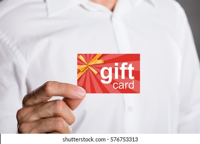 Close-up Of A Man Holding Prepaid Gift Card