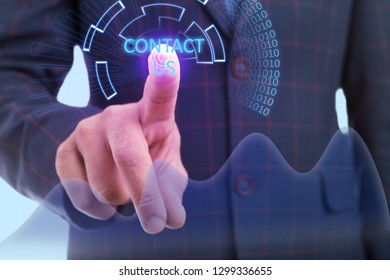 Close-up of man index finger touching contact us button on invisible display as futuristic concept - Shutterstock ID 1299336655