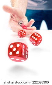 A Closeup Of A Man Throwing Dice.