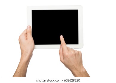 Closeup Of Man Touching Digital Tablet Display, Cutout. Male Hand Holding Digital Tablet And Pointing With Index Finger On Blank Screen, White Isolated Background, Copy Space