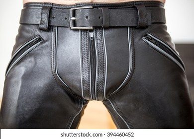 Close-up Of Man Wearing Black Fetish Leather Pants