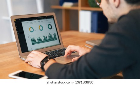 Closeup Of Man Working On Laptop With Finances Or Ceo, Graph, Business Analytics And Strategy