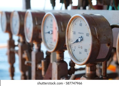 Closeup Of Manometer, Measuring Gas Pressure. Pipes And Valves At Industrial Plant.Pressure Gauge, Measuring Instrument Close Up On Oil And Gas Pipeline.