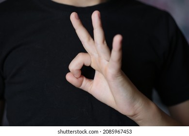What does two fingers sideways mean
