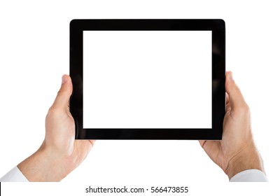 Close-up Of Man's Hand Holding Digital Tablet On White Background