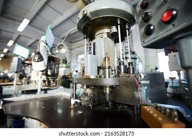 Close-up Of Manufacturing Machine Of Clock Factory Used For Watch Mechanism Production