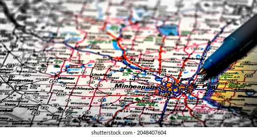 Closeup map of city Minneapolis for travel destination driving plan with pen for traveling
