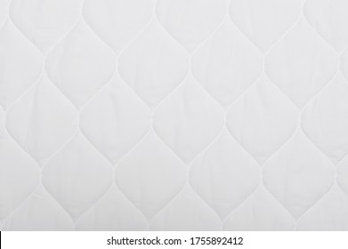 Closeup mattress texture background comfortable bed topper fabric bed sheet