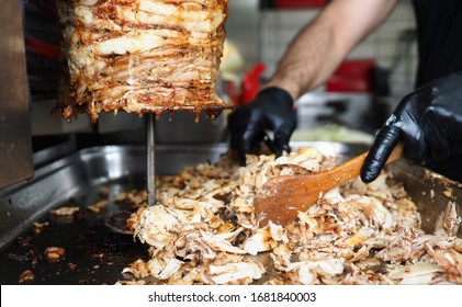 Close-up Meat On Special Equipment, Cook Shawarma. Modern Equipment For Street Trading. Opening Successful Shawarma. Electric Shawarma Machine. Business, Production And Sale Shawarma