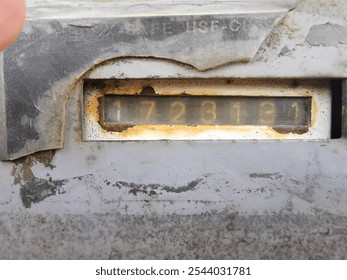 a close-up of a mechanical counter or meter display, likely part of industrial equipment. This meter could be part of machinery used for counting operations, tracking hours - Powered by Shutterstock