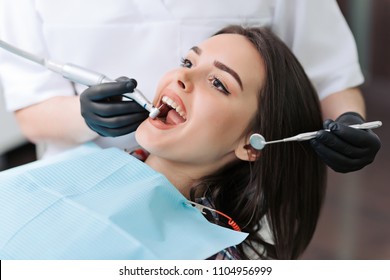 Close-up Medical Dentist Procedure Of Teeth Cleaning