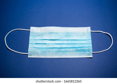 Close-up Of Medical Flu Mask, Blue Of Color, On Background Of Phantom Blue Color.