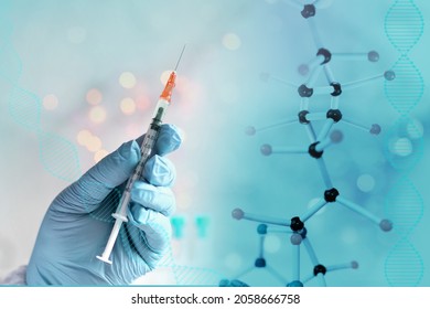 Close-up Of Medical Syringe For Injection Into Female Hand, A Doctor, A Nurse Preparing To Inject Vaccine, Concept Of Compulsory Vaccination Against Coronavirus Covid 19, Beauty Cosmetic Injections