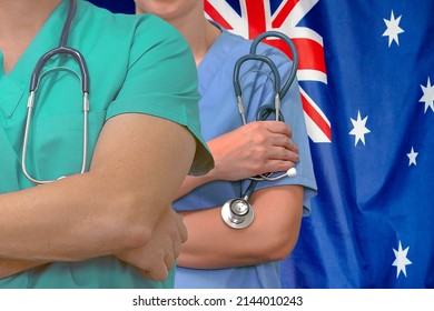 Close-up Medical Team Man And Woman Surgeons Of The Australia Flag Background. Professional Surgery In Australia. Medical Technology Research Institute And Doctor Staff Service Concept In Australia