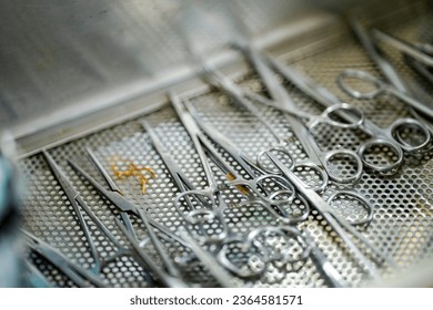 Closeup medical tools and scissors for dressing wounds of veterinary in clinic - Shutterstock ID 2364581571