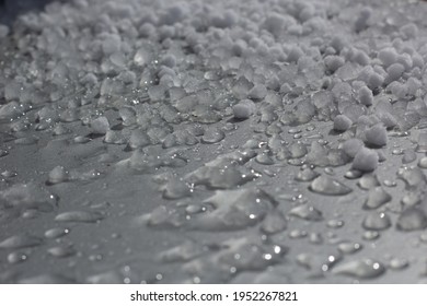 Closeup Of Melting Graupel On A Windowsill.