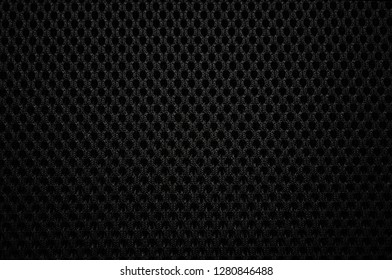Closeup of mesh fabric pattern of the backrest of chair  