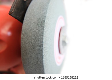 Closeup Metal Flexible Grinding Wheel For Bench Grinding Machine On White Background