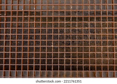 Close  up the metal grating the sewer drain  rusted and time  The infrastructure big city  sewer grate 