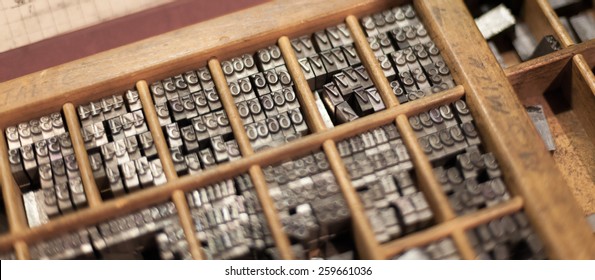 Close-up Of Metal Letterpress Letters In Printing Machine