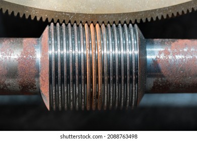 Closeup of metal Worm Wheel, Worm Gear on white background