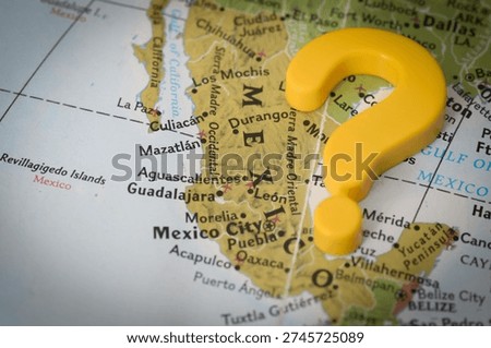 Close-Up of Mexico Map Featuring Cities and Question Mark Symbolizing Uncertainty