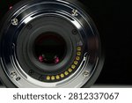 Close-up of Micro Four Thirds M43 lens mount for macro photography on black