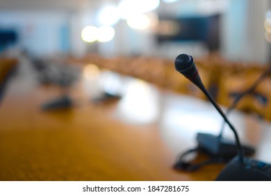 
Close-up Of A Microphone In A Large Empty Conference Room