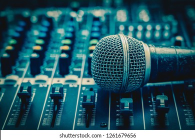 Closeup Microphone Over The Audio Mixer, Vintage Film Style, Music Equipment Concept