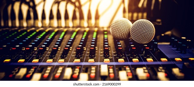 Close-up microphone and sound mixer in studio for sound record control system and audio equipment and music instrument - Shutterstock ID 2169000299