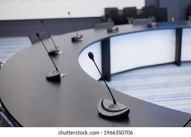 Close-up Of Microphones In An Empty Meeting Room At A Press Conference.