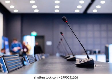 Close-up Of Microphones In An Empty Meeting Room At A Press Conference.