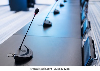 Close-up Of Microphones In An Empty Meeting Room At A Press Conference.