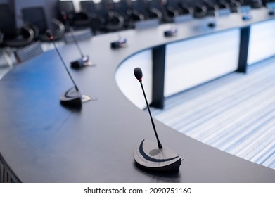 Close-up Of Microphones In An Empty Meeting Room At A Press Conference.