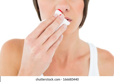 Close-up Mid Section Of A Young Woman With Bleeding Nose Over White Background