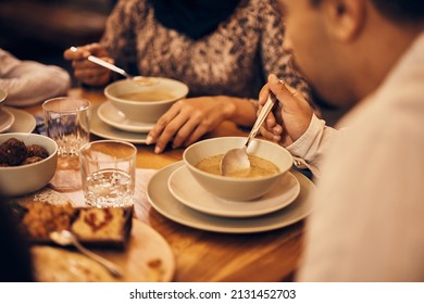 Close-up Of Middle Eastern Family Having Evening Meal At Dining Table On Ramadan.