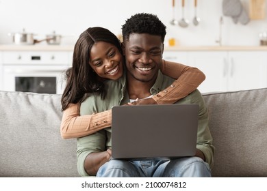 Closeup Of Millennial African American Family Husband And Wife Using Computer Together At Home, Loving Black Man And Woman Having Online Party With Friends Or Relatives, Copy Space