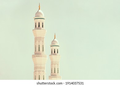 Close-up The Minarets Of The Mosque. Islam, Religion And Architecture. Islamic Background Mosque. Creative Abstract Photography.