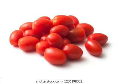 Closeup Of Mini Organic Tomatoes Roma On White Background