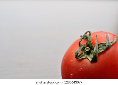 a closeup of a mini tomato