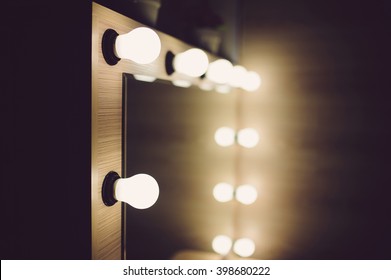 Closeup Of Mirror Bulbs At Make Up Room